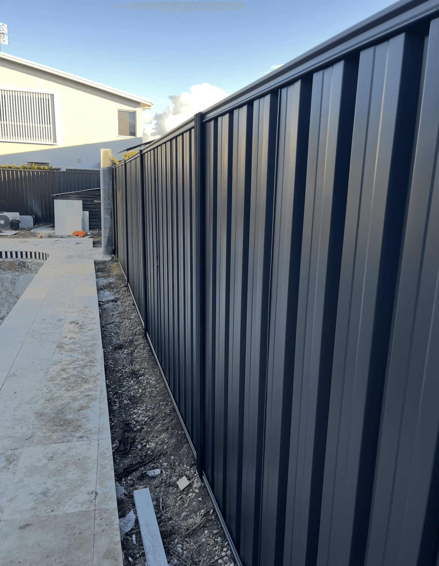 Freshly painted residential timber fence — Gold Coast fence painting