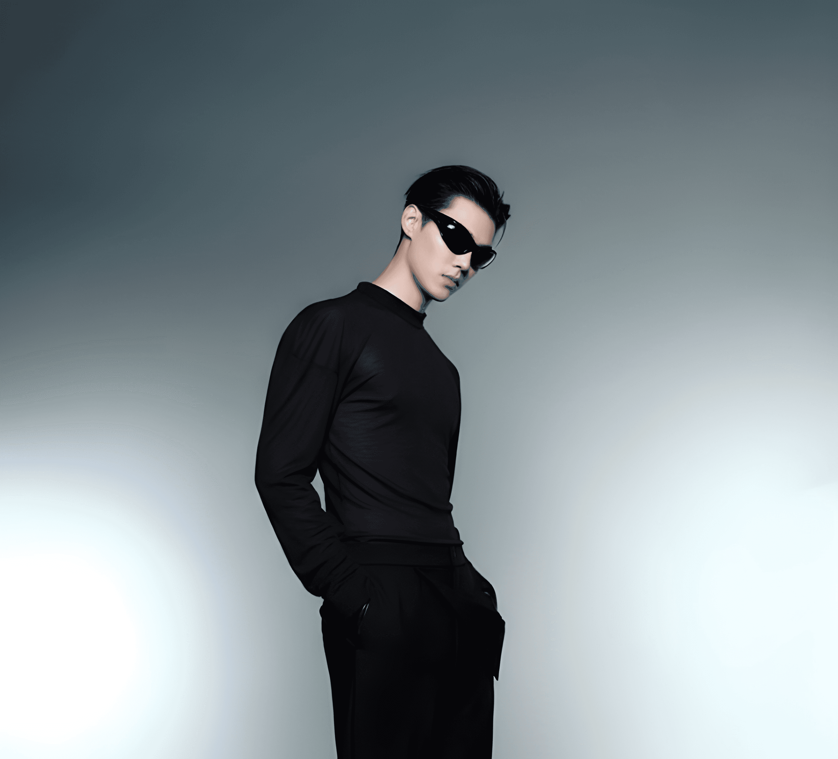 Man in black clothes in studio posing