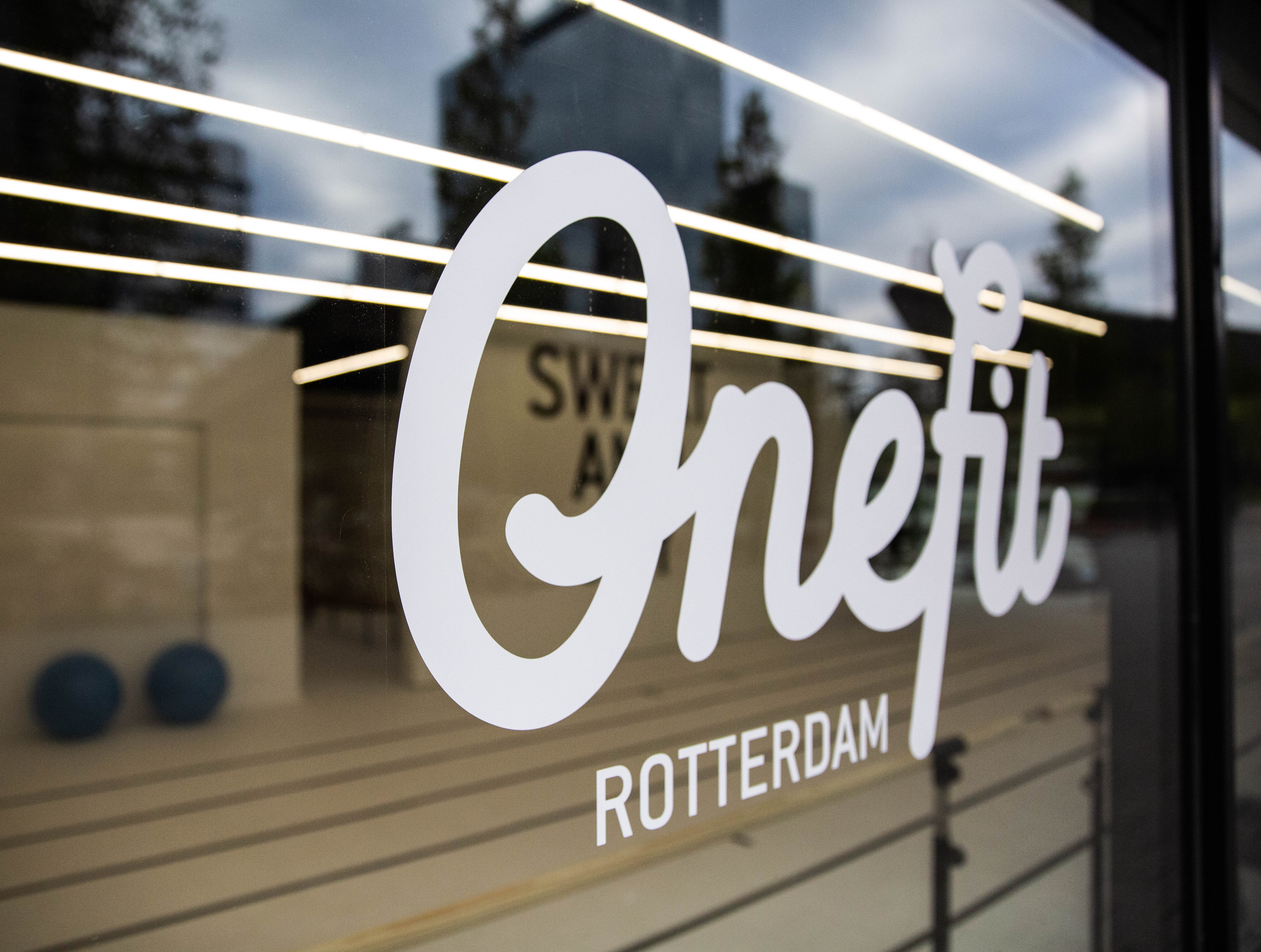 Photo of the facade showing the OneFit logo on the facade
