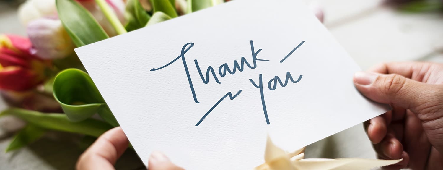 A card and flowers to say thank you