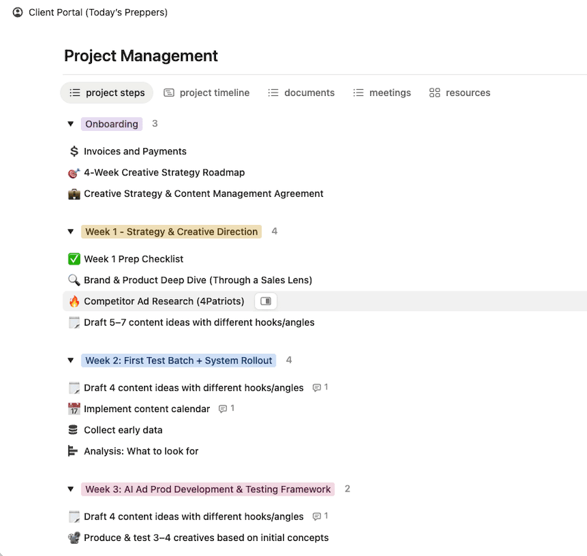 a laptop computer sitting on top of a wooden desk