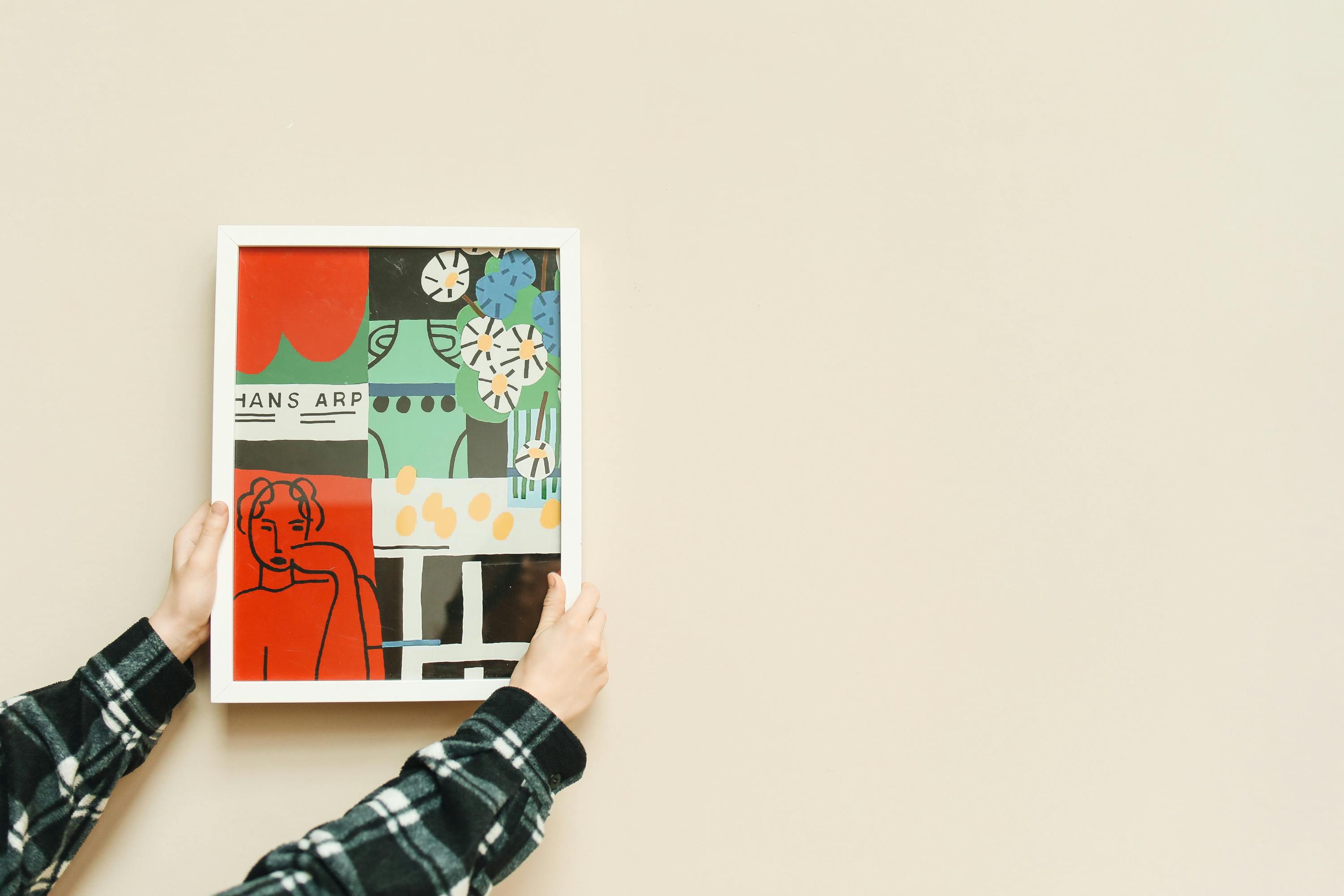 a woman in a white dress holding a tennis racquet