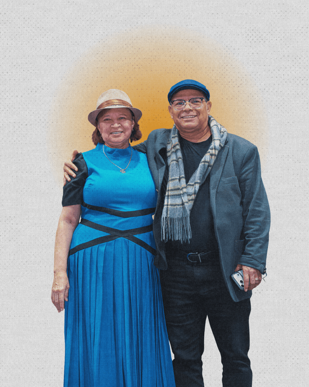 a man and a woman standing in a field