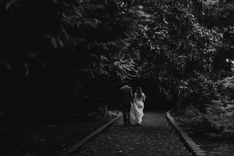 black and white picture a cuple walk together