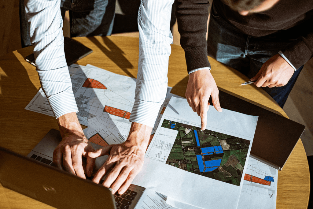 Rows of solar panels under a cloudy sky