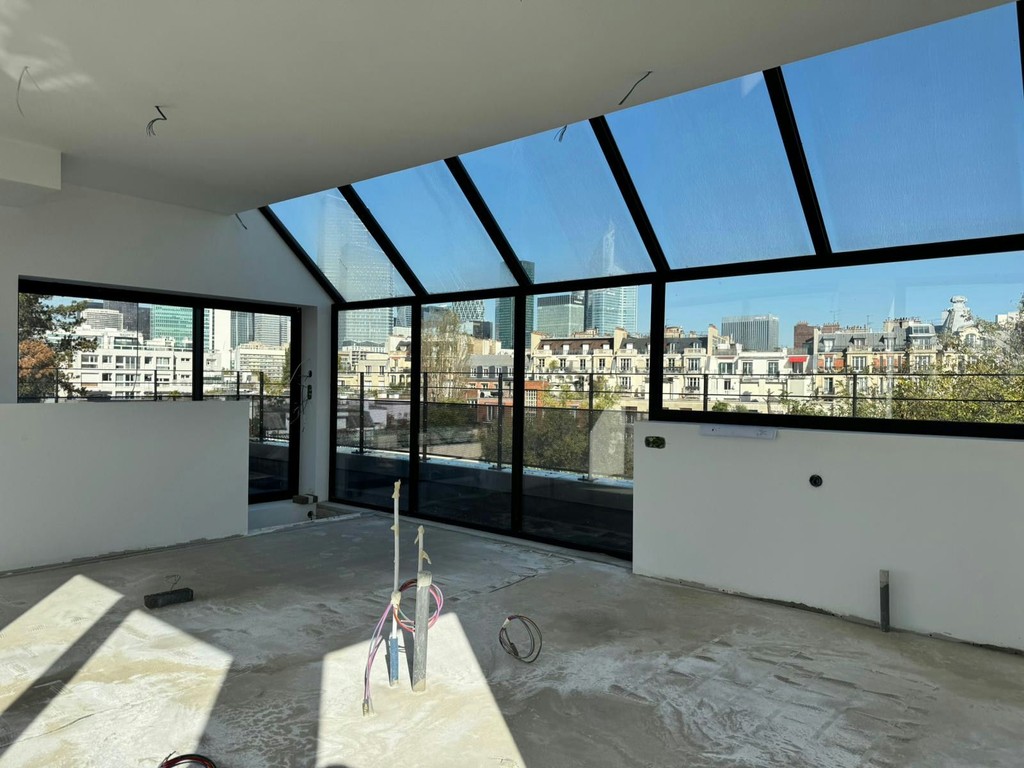 Véranda à Neuilly sur Seine par DIFFERENT