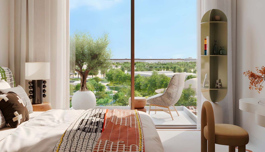 A bedroom featuring a city view and a tree, showcasing the Hillsedge by Emaar design.