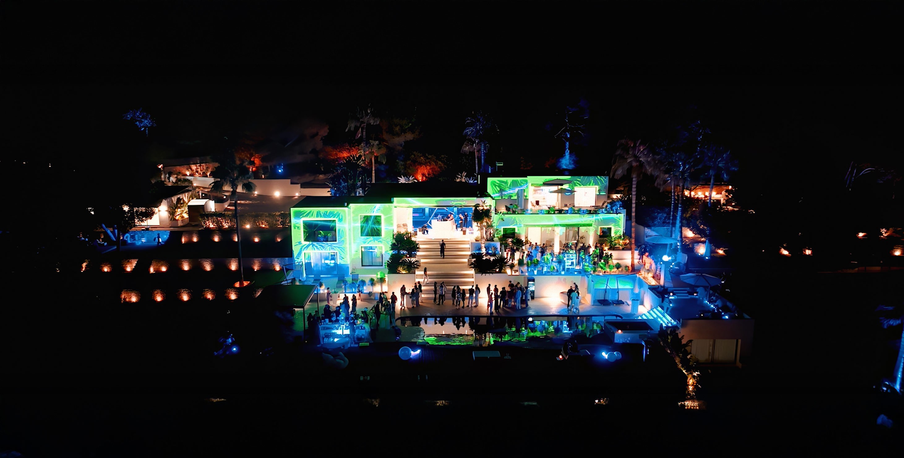 Drone shot of illuminated Can Nemo, exclusive luxury villa Ibiza private estate property