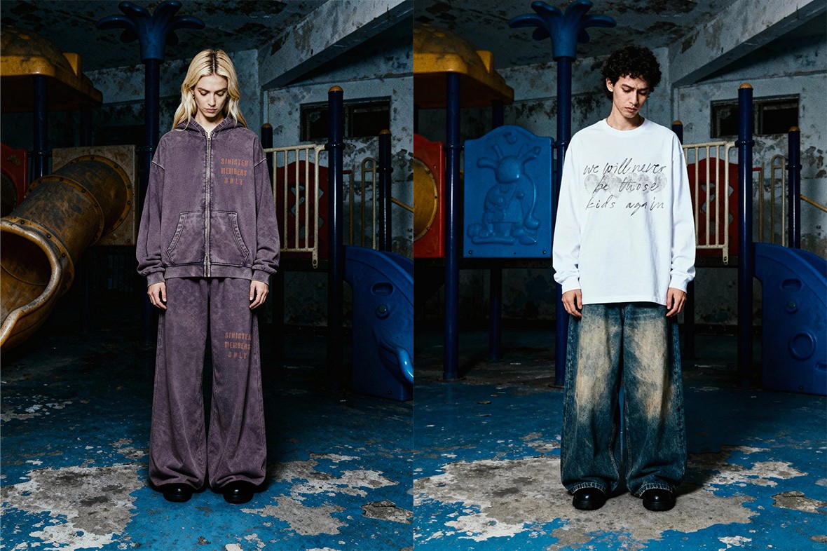 Two models wearing oversized streetwear from Youth Distortion collection, photographed in an urban playground at night.