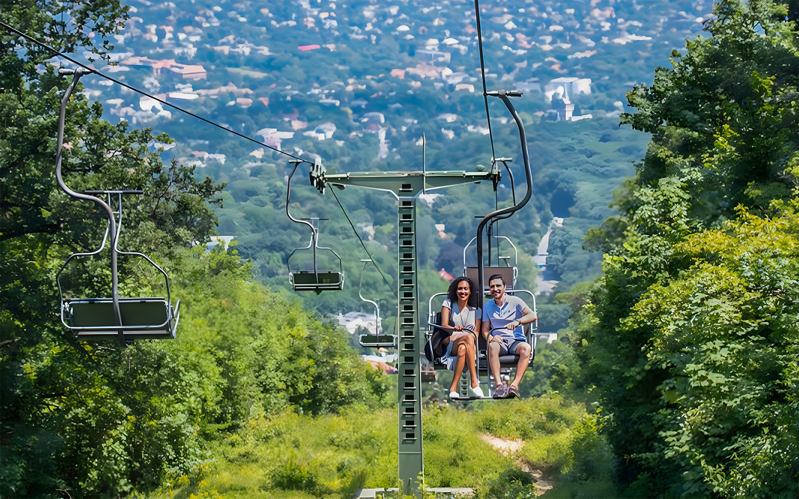 Gondola lift station in Budapest with tourists boarding for city views.