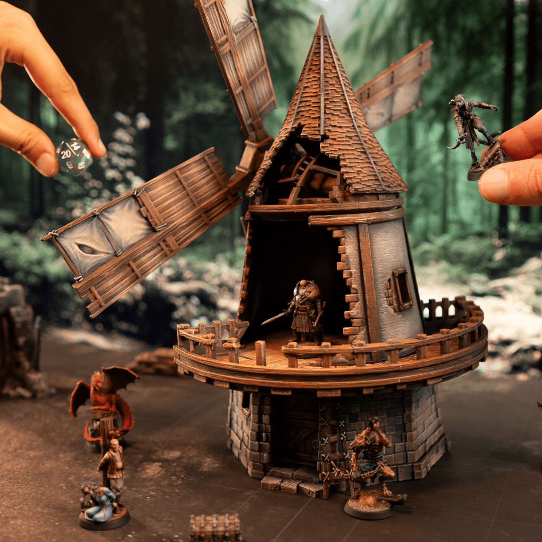 A man using a 3D printer to create a resin miniature from Loot Studios.