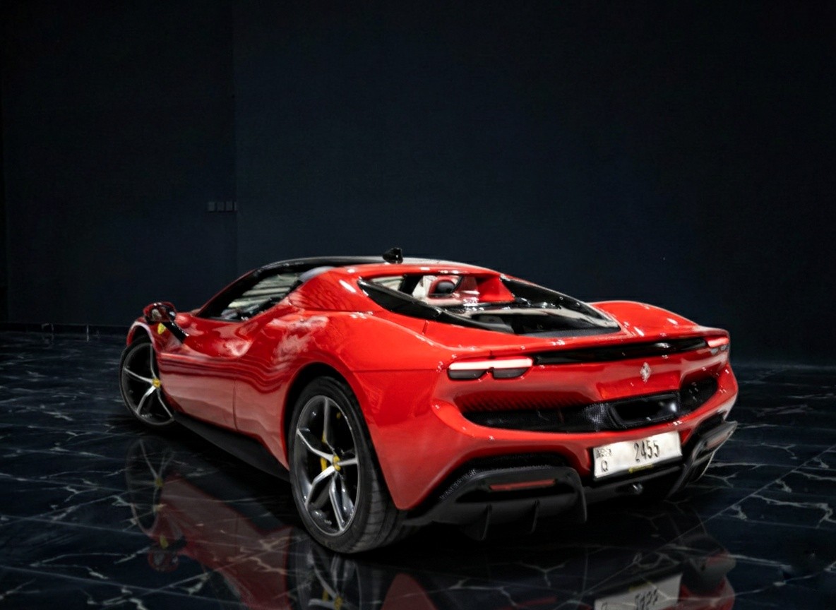 Ferrari 296 GTS 2024 rear side exterior highlighting sculpted lines and open-top hybrid Ferrari performance.