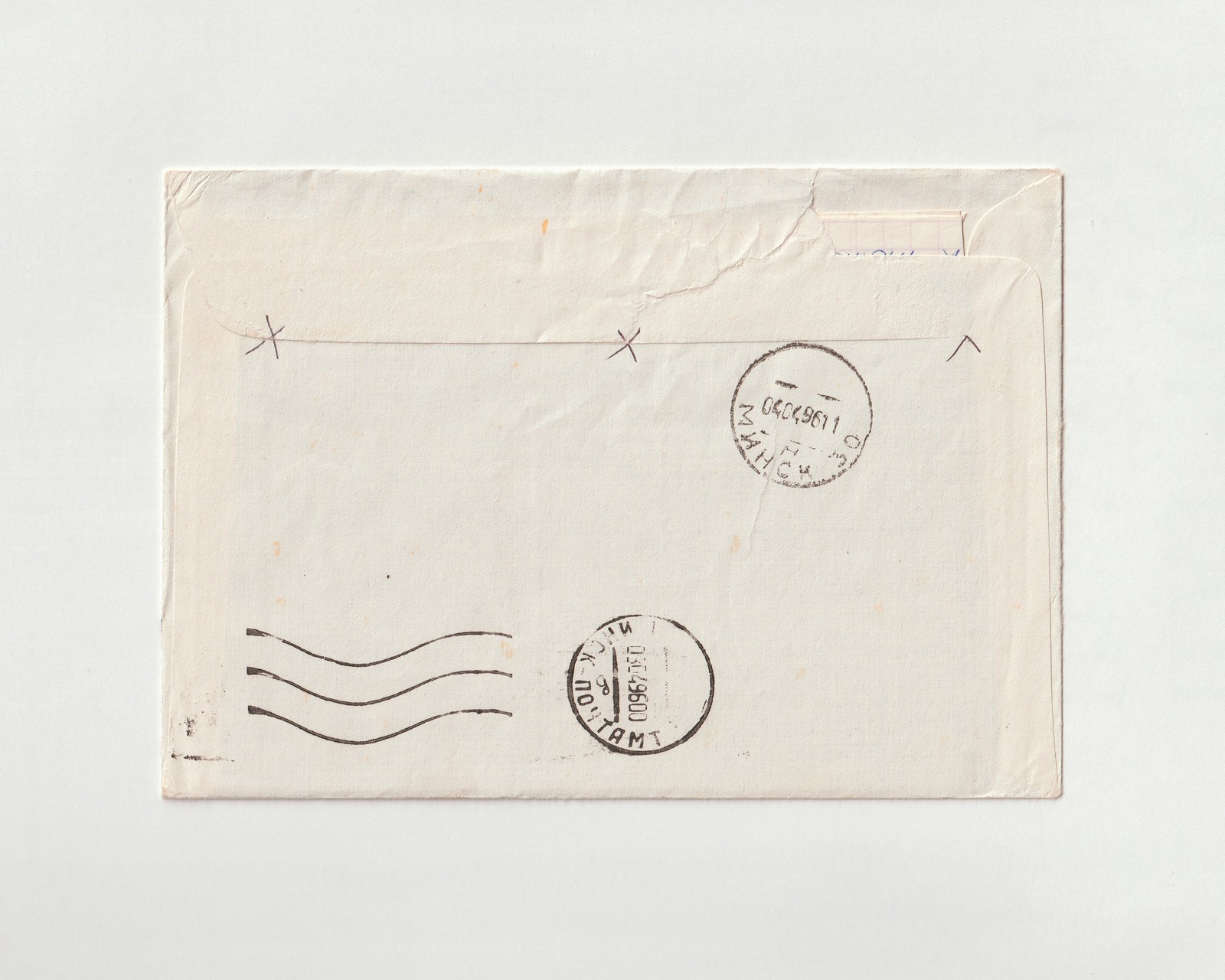 A piece of paper with a stamp on it, on an article about changing a passport application from routine to expedited