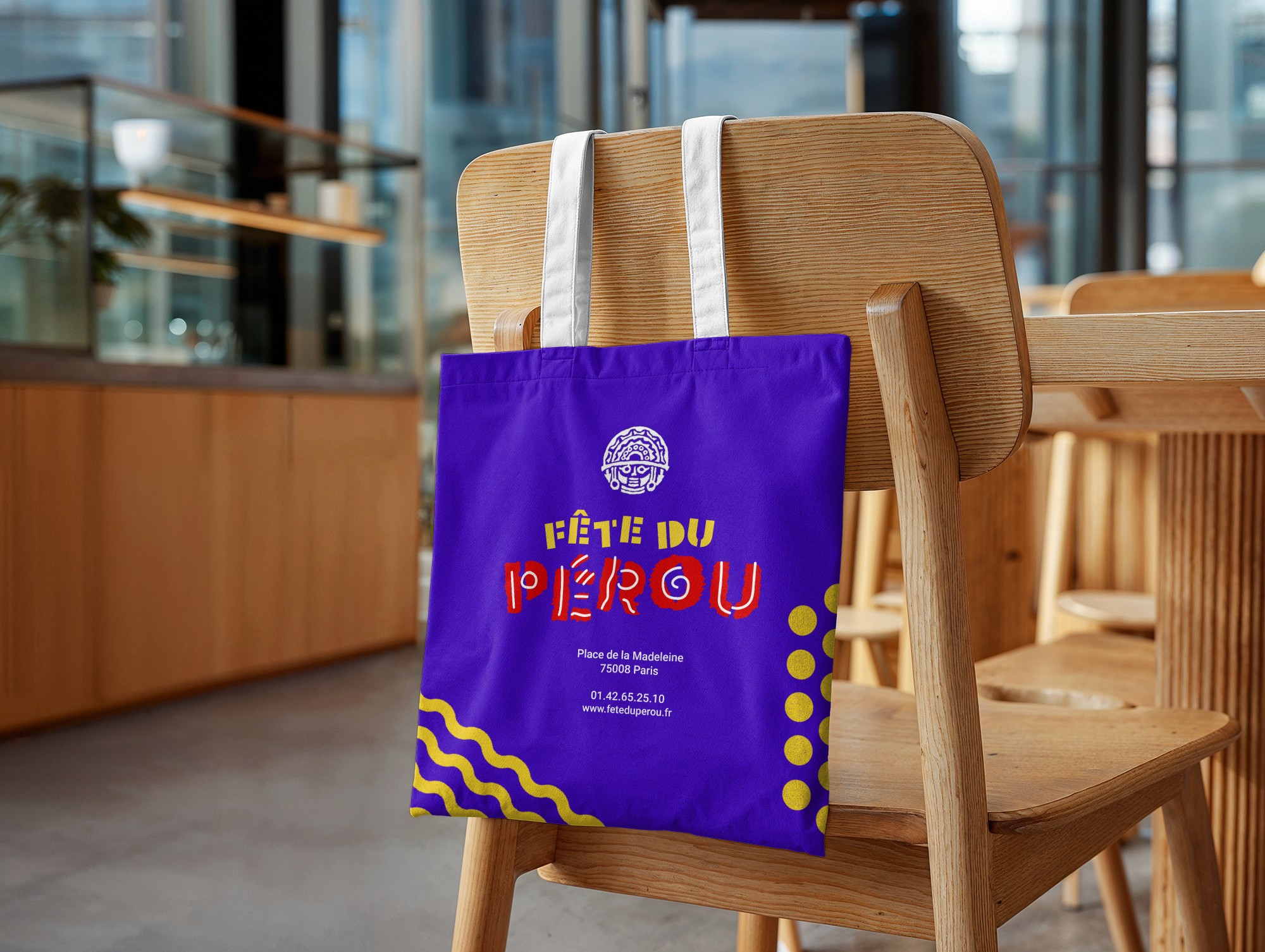 Tote bag application of Fiestas Patrias Peru identity, translating custom typography and cultural symbols into a bold contemporary merchandise design