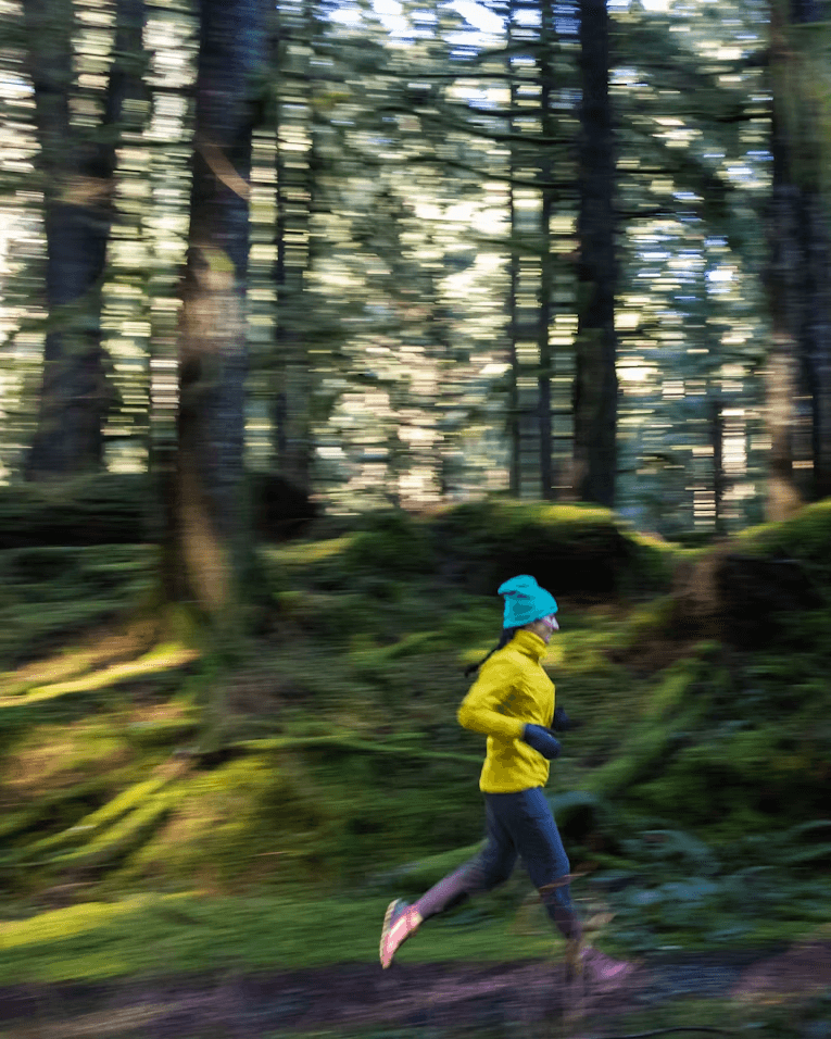 A women running in forest