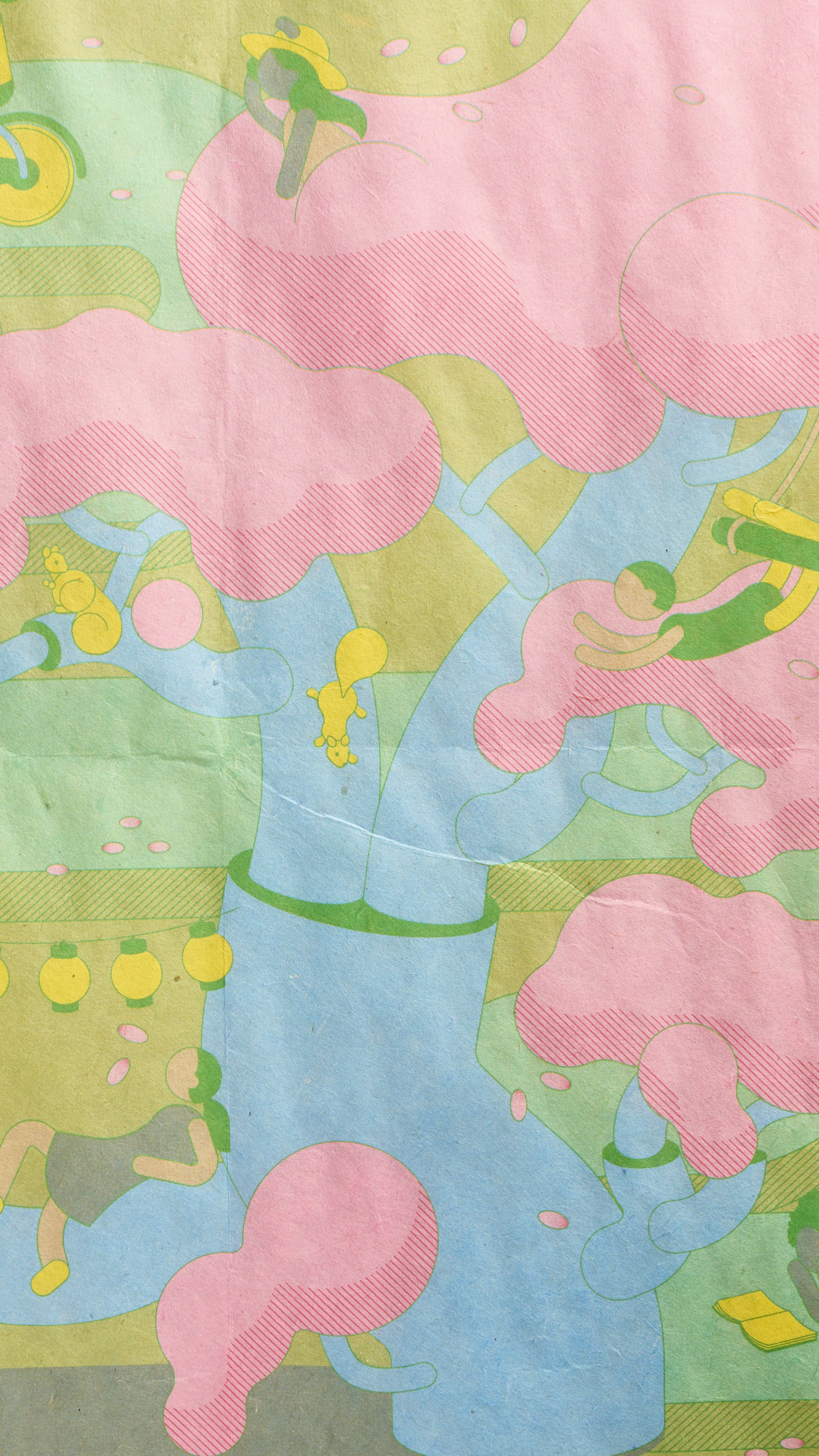 Close-up of the illustrated wrapping paper showing spring illustration patterns, soft green and pink tones, and flowing organic shapes.