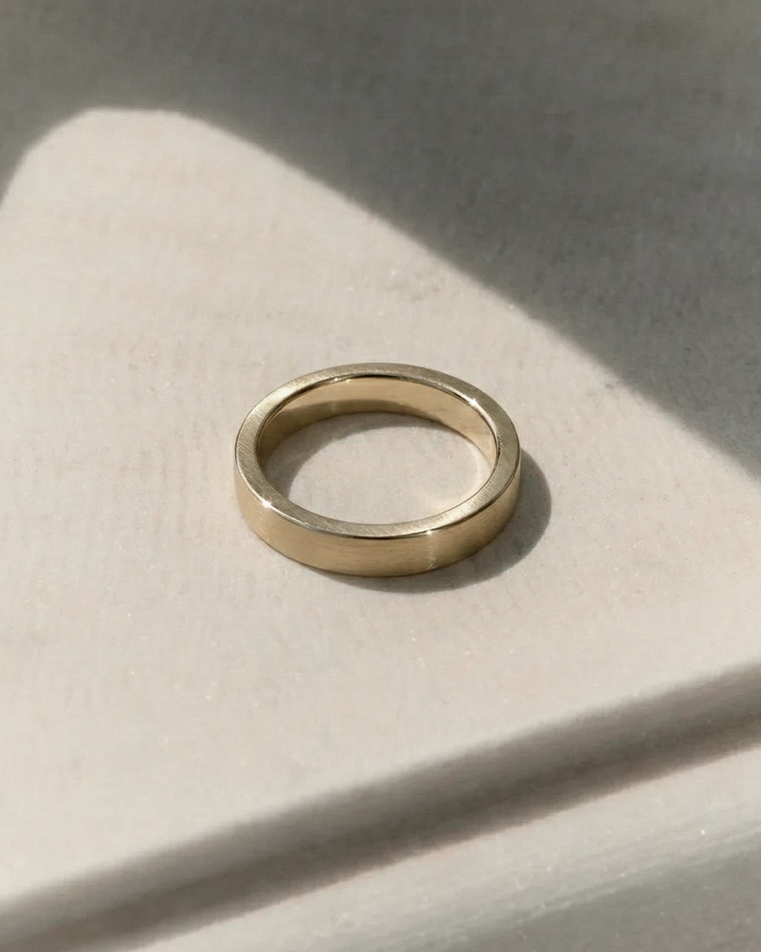 Streetside billboard with flyposters of the Batch.Works brand and illustrations