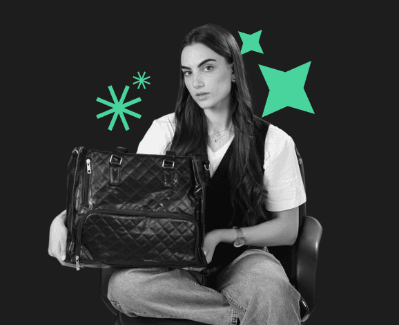 model holding athena bag