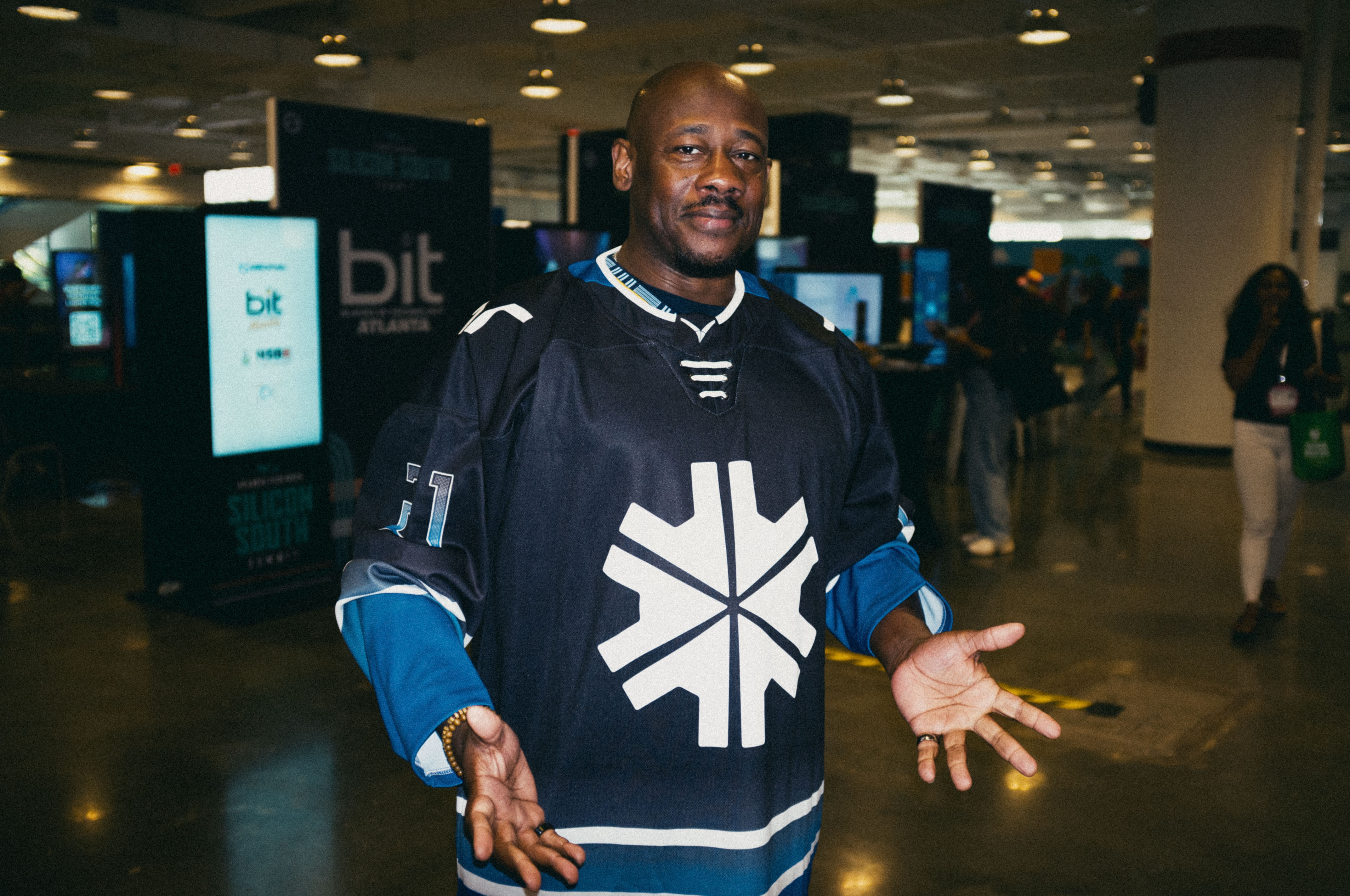 person walking holding brown leather bag