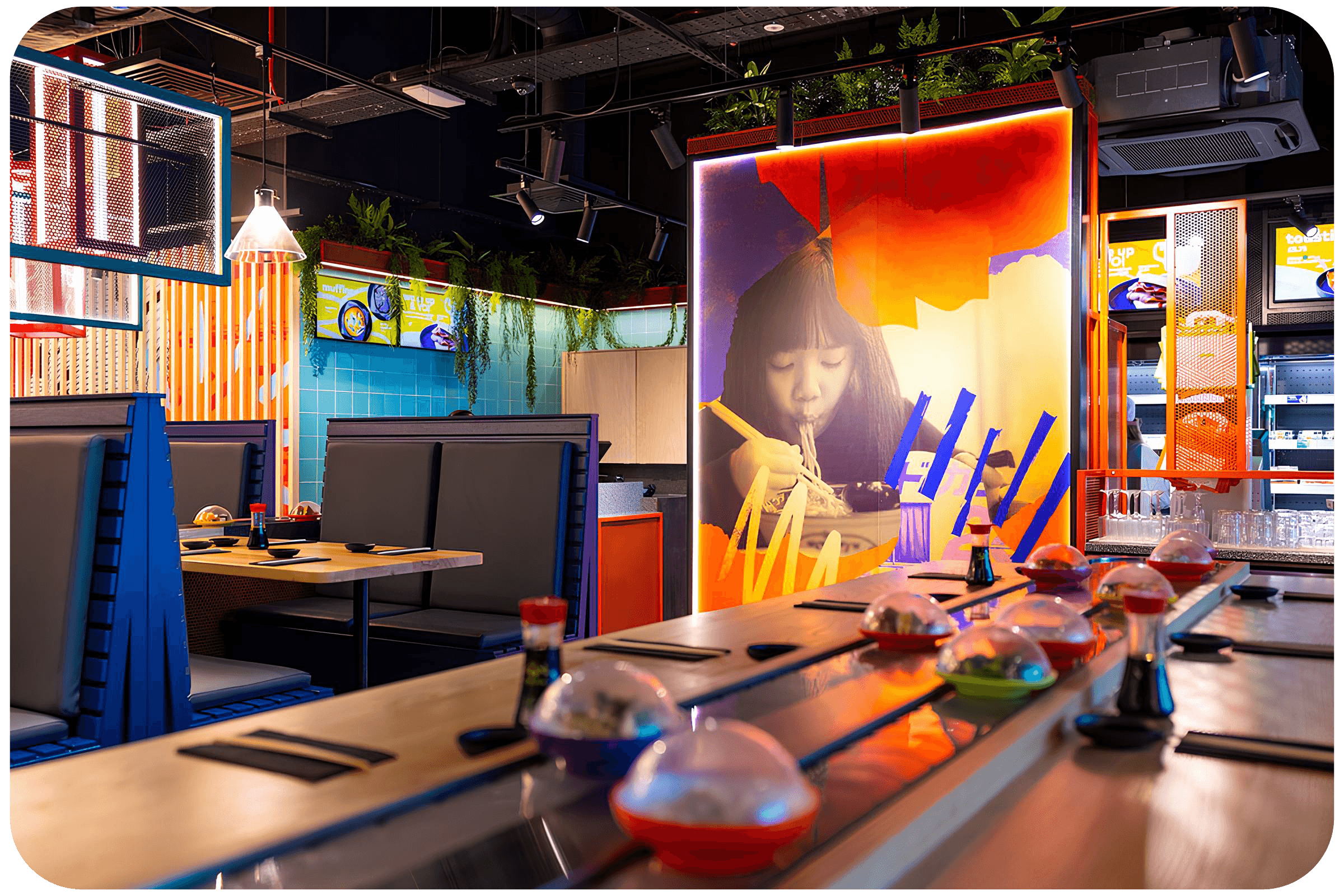 YO! Sushi restaurant fit-out with booth seating, conveyor counter and bespoke shopfitting details