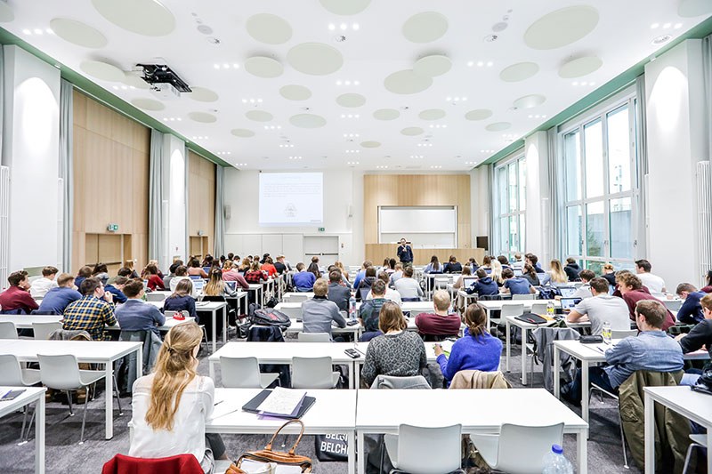 a black and white living room with a large tv