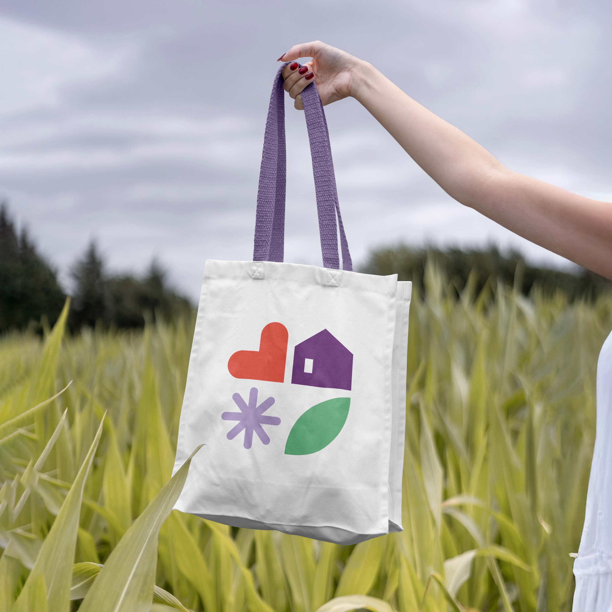 Logo de la résidence Nold, formes graphiques et couleurs pastel