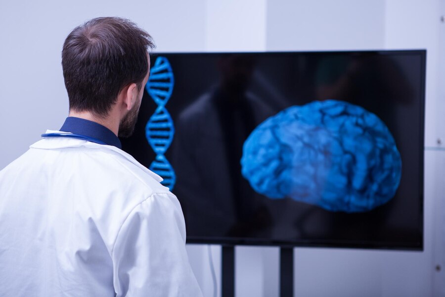 A doctor looking at his patinets brain after the procedure.