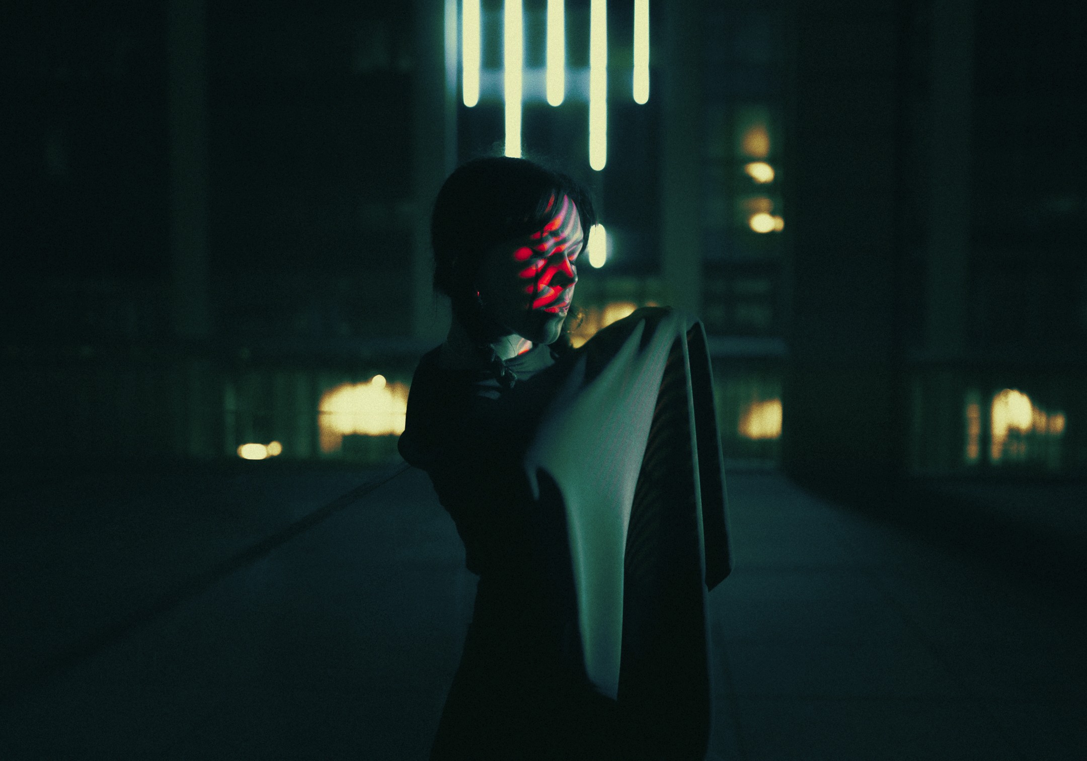 a woman laying on her back and looking at me