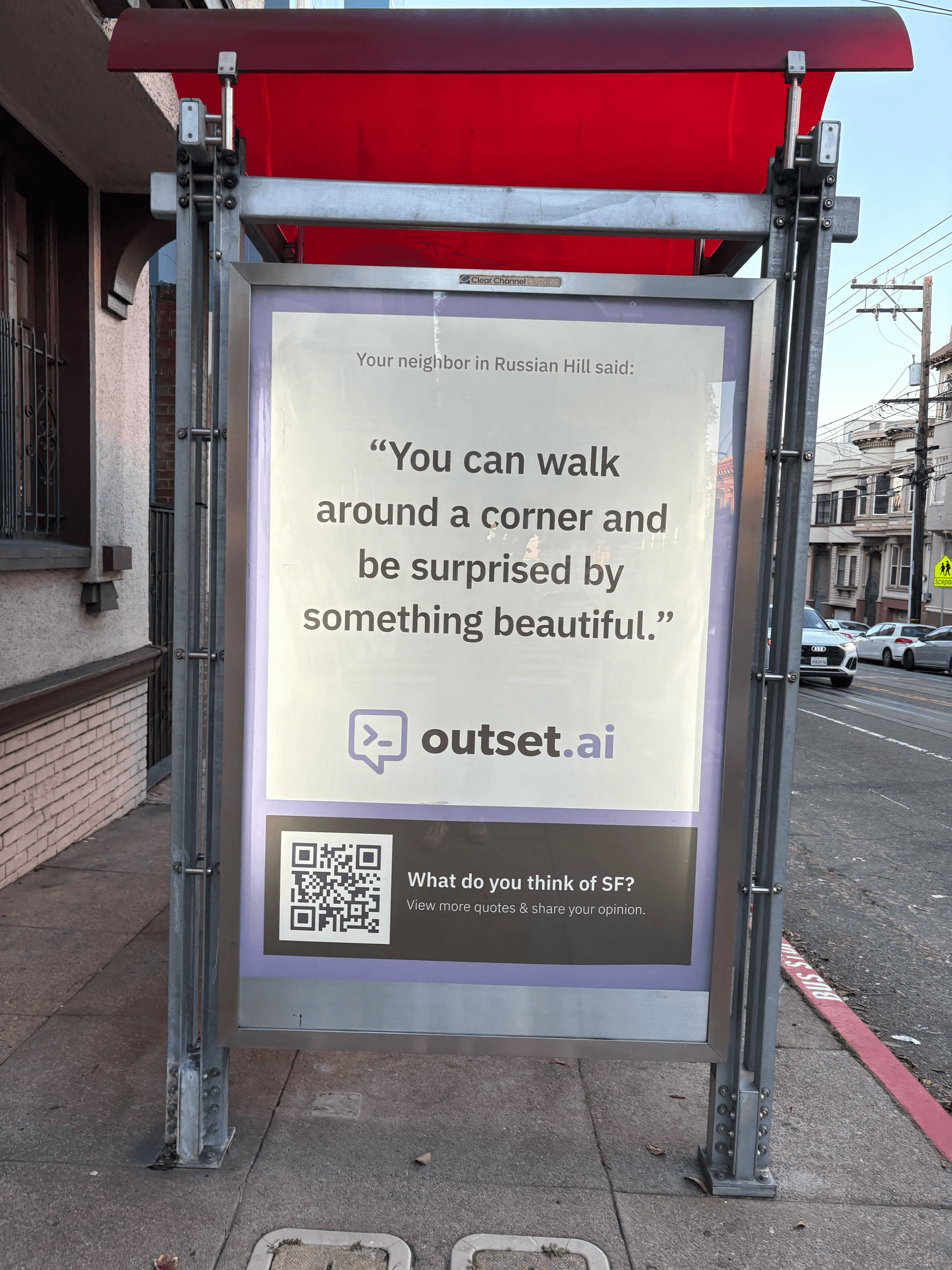 Outset bus shelter ad in San Francisco featuring a resident quote about discovering something beautiful around a corner, with a QR code inviting feedback