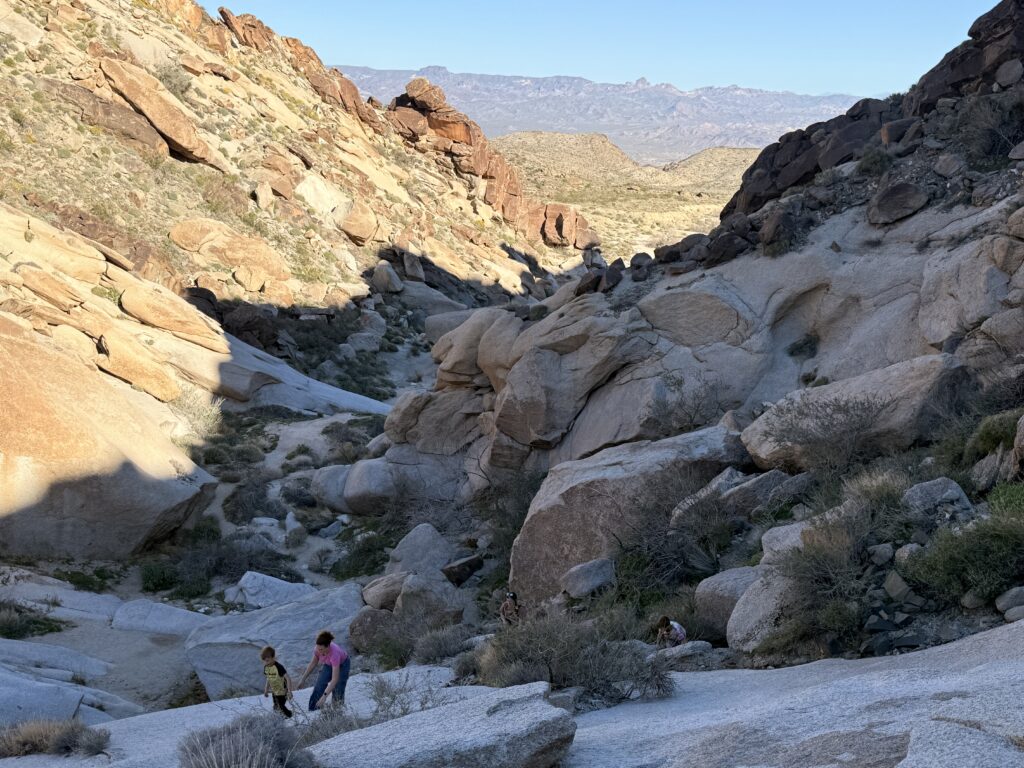 Hiking through a rocky desert canyon near Bullhead City, Arizona