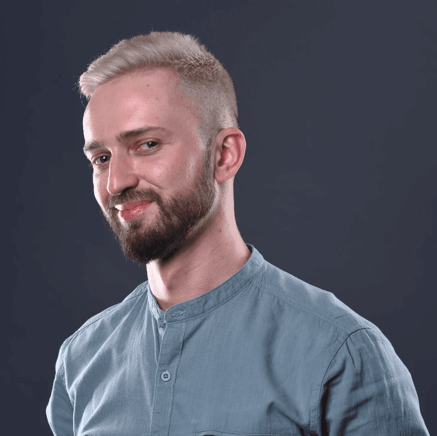 A portrait of a young man smiling
