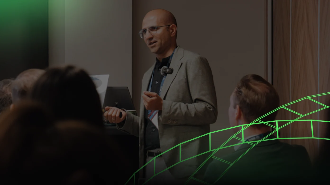 Speaker on stage in front of an audience