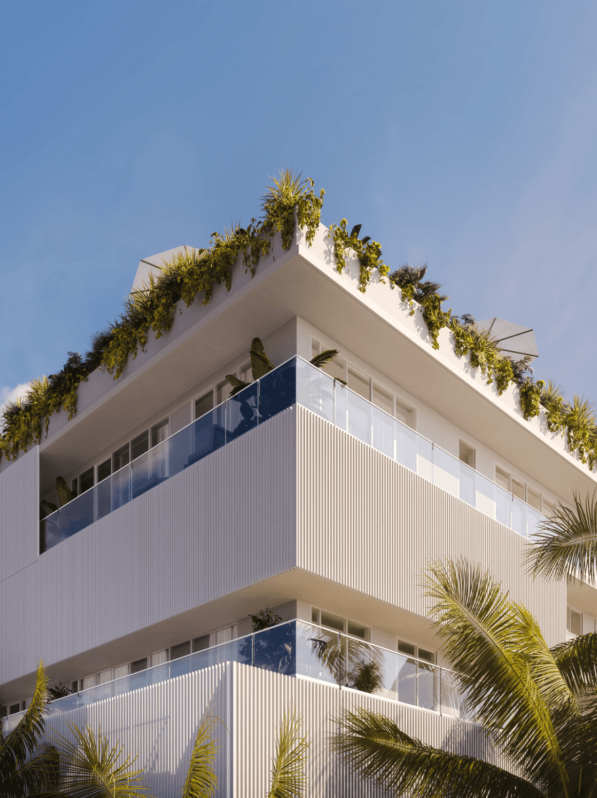 A contemporary apartment building featuring palm trees and a spacious balcony, showcasing modern architectural design.