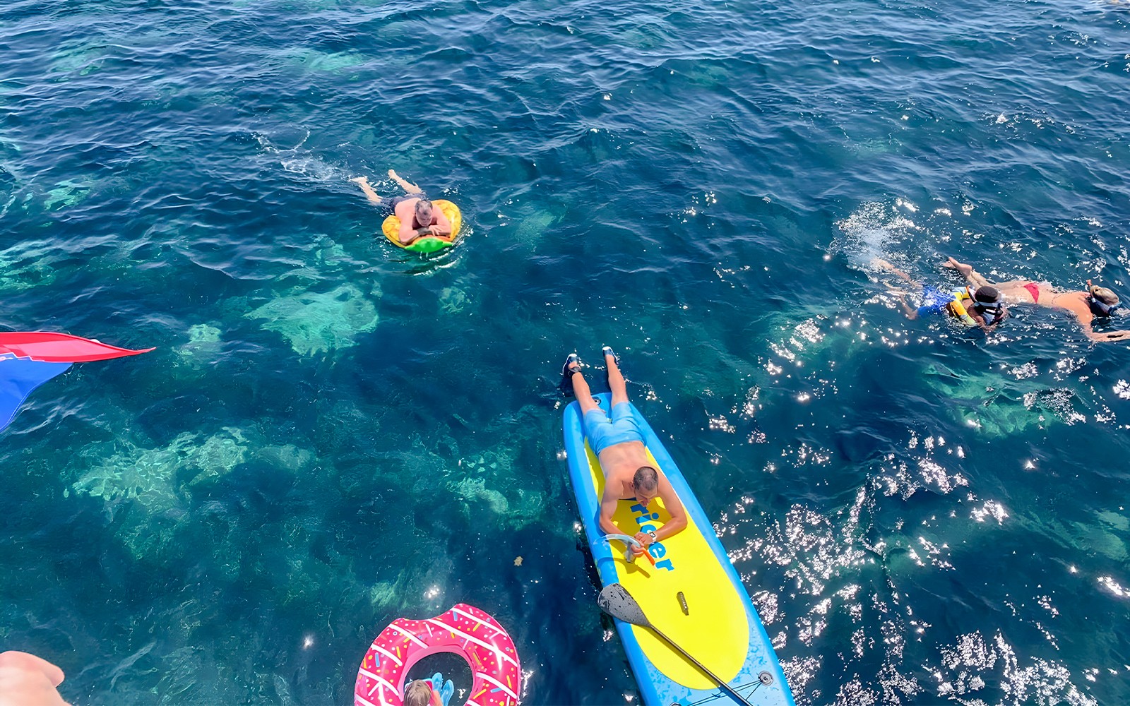 People enjoying water activities near Split, Croatia, during a Hvar and islands cruise.