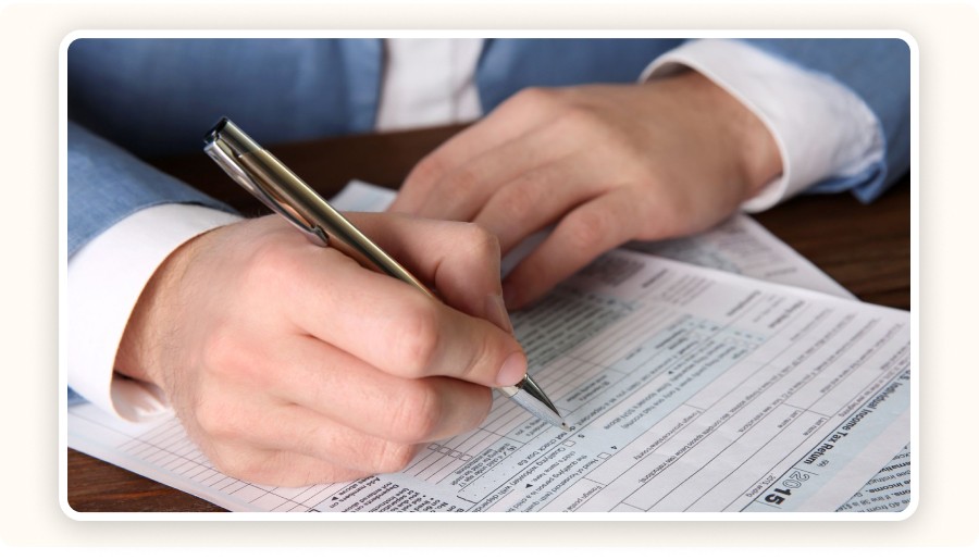 Entrepreneur filling out administrative paperwork