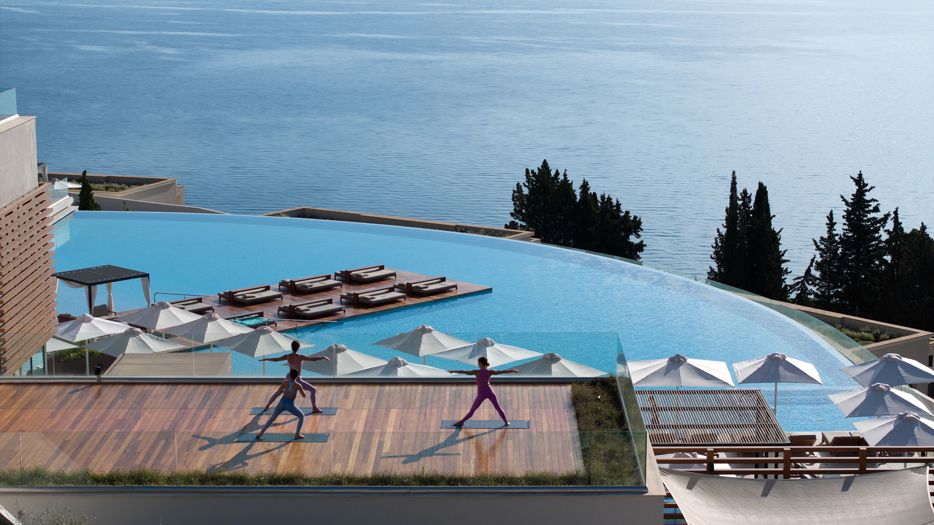 A bright yoga studio with a girl practicing gentle restorative yoga.