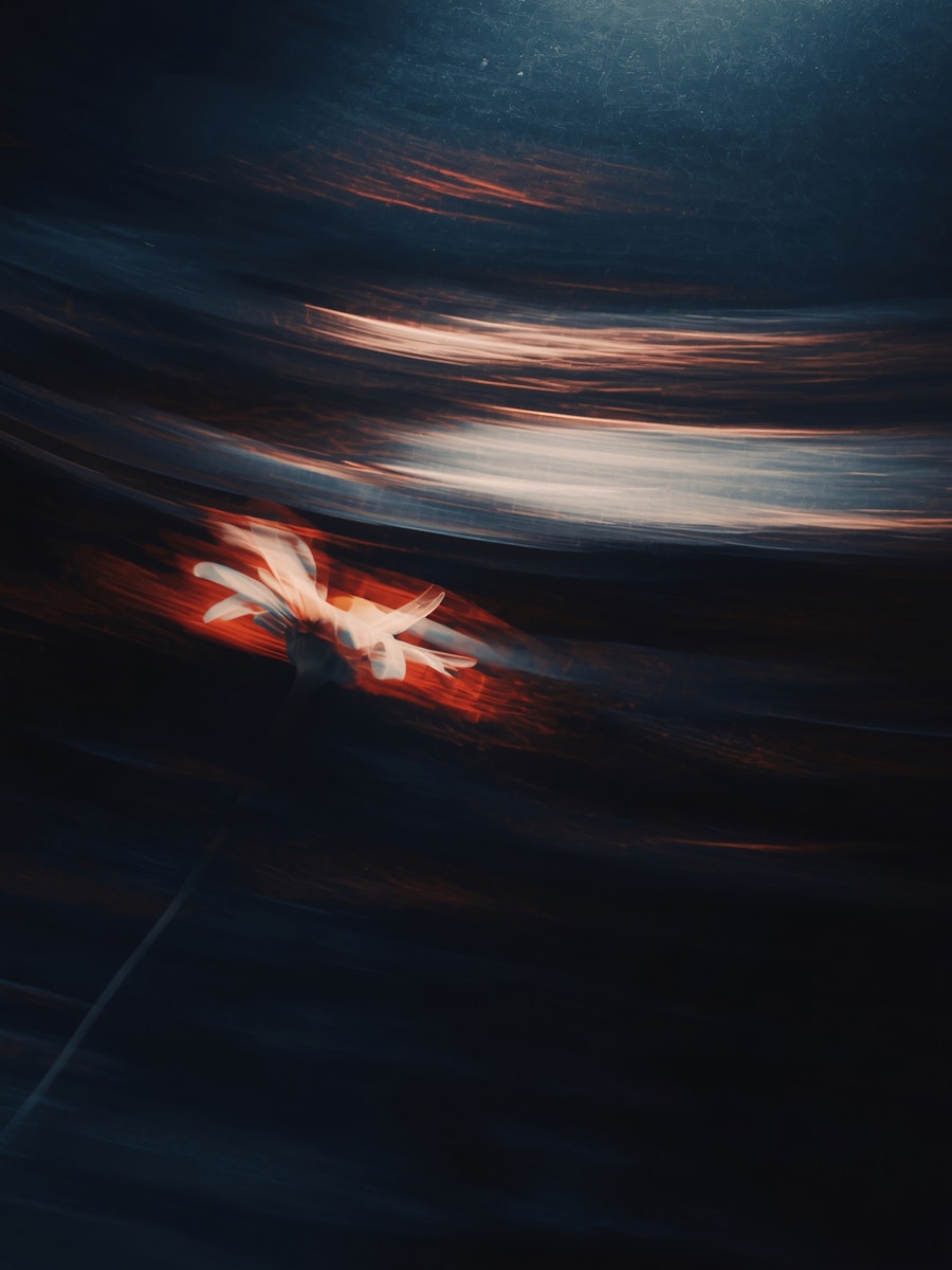 two people looking at a tablet and smiling