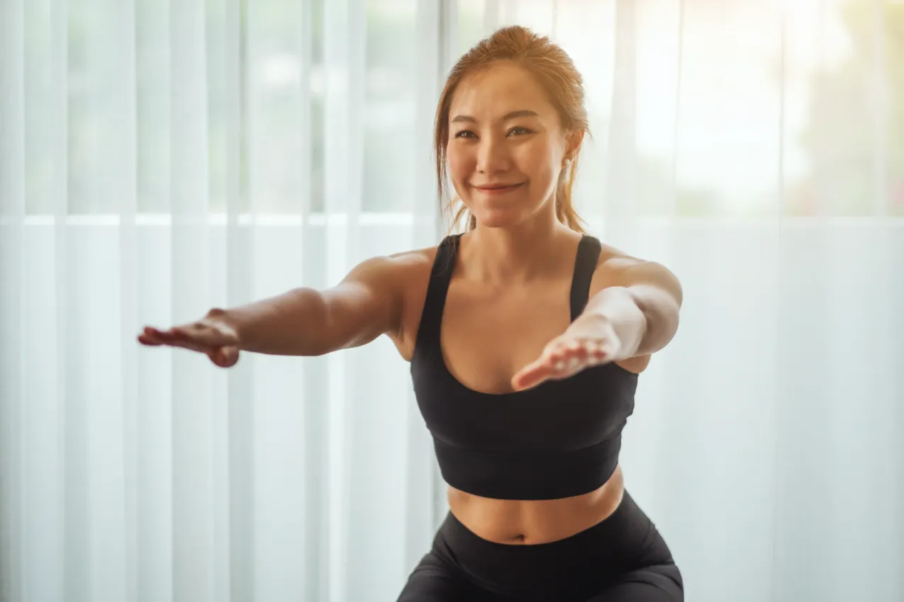 asian woman squatting