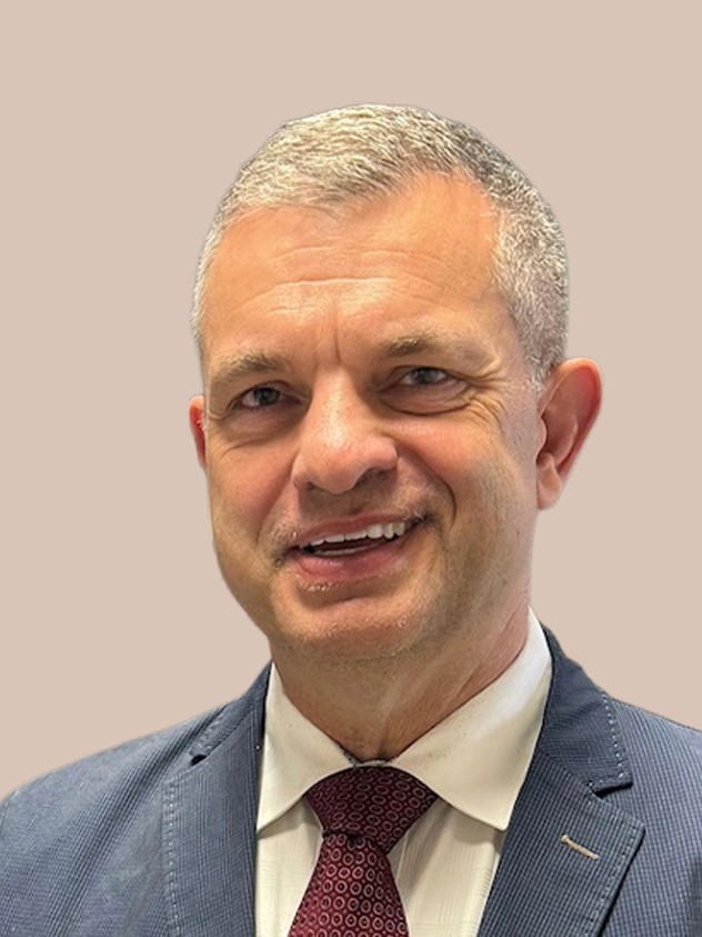 Headshot of Dennis Pousak immigration lawyer at Manifest Law