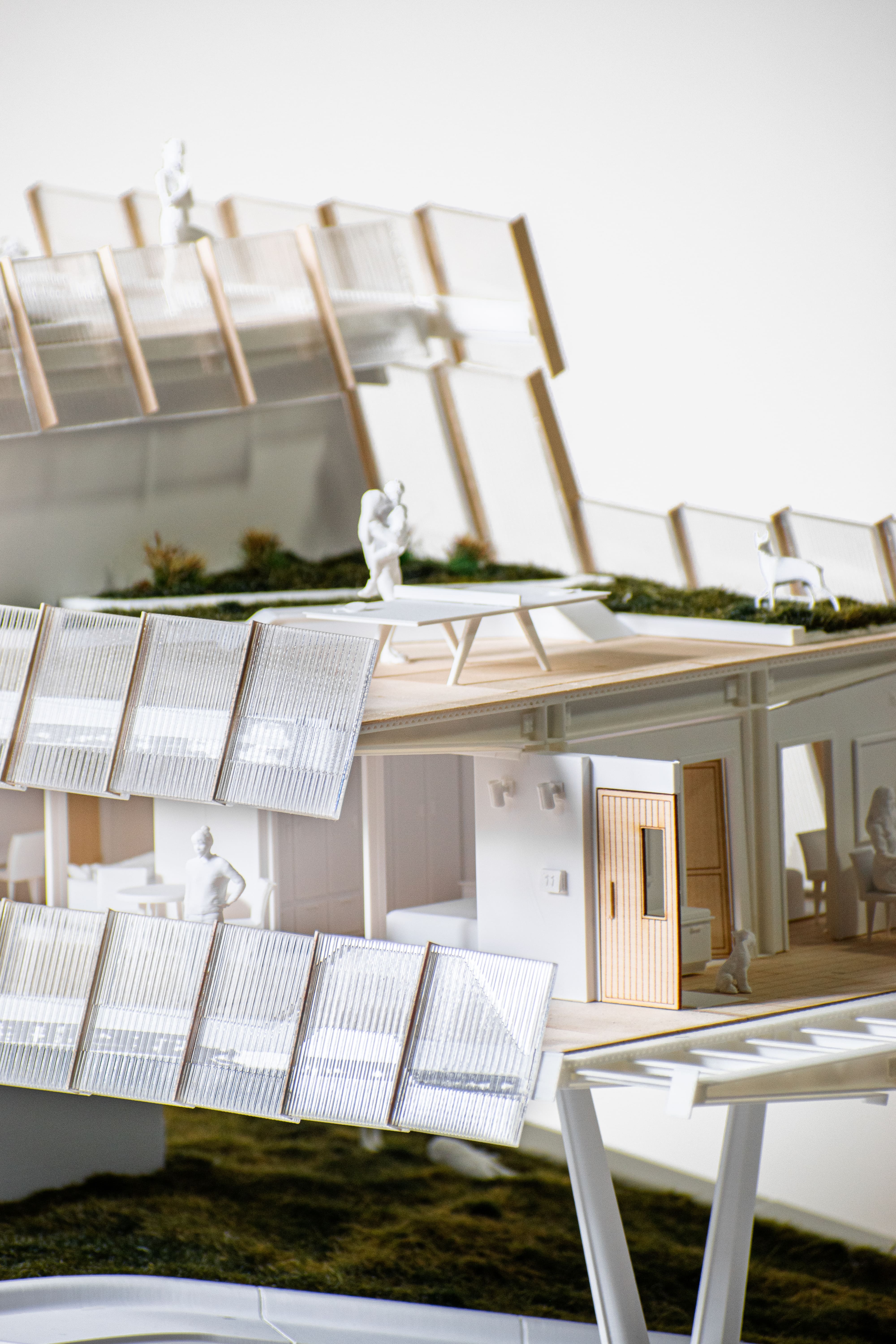 The upper floors float above the public realm and create space for shared activities.