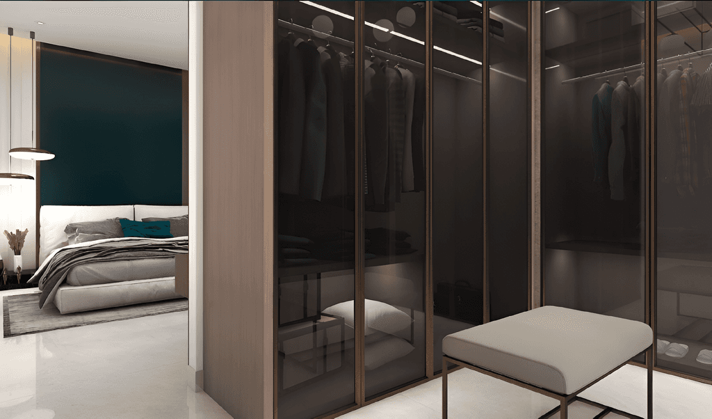 Stylish bedroom at Rose Gold Residences showcasing a cozy bed, chic furnishings, and warm rose gold tones throughout.
