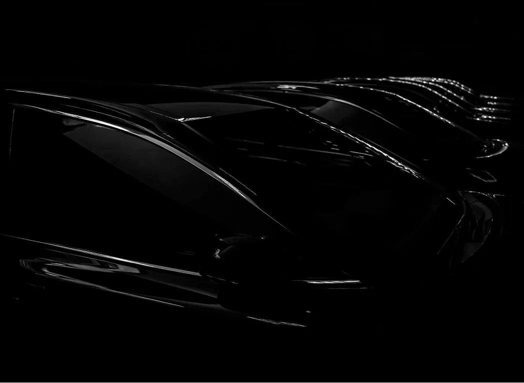 Light trails forming curved lines in a tunnel or circular pattern