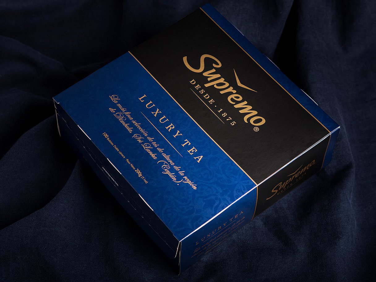 Rustic cabin in a golden field at sunset