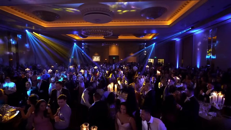 Wedding guests dancing to the music from NightStyle DJs.