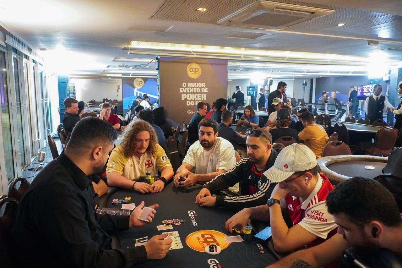 person writing on a piece of paper 