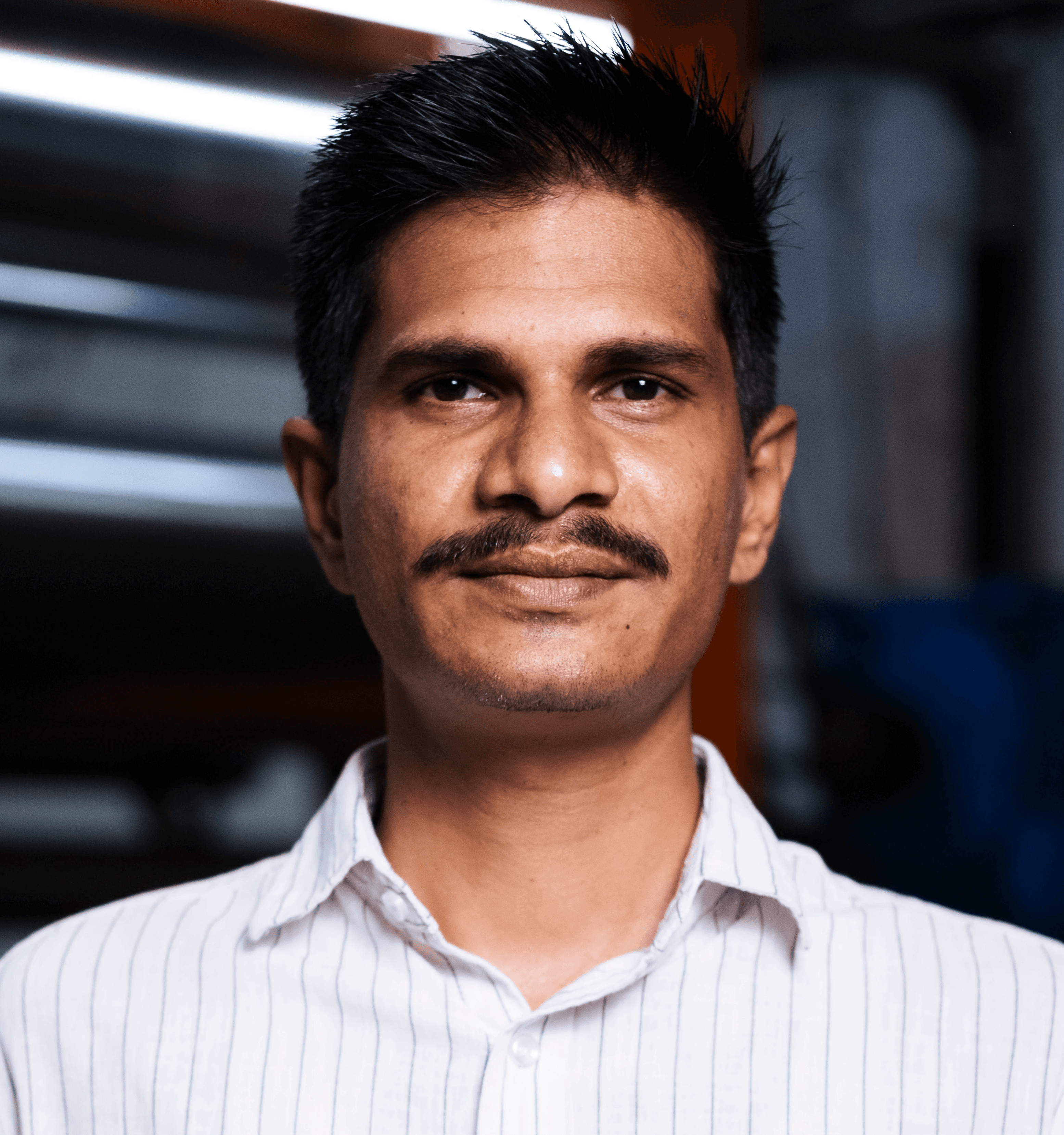 Man smiling in an office