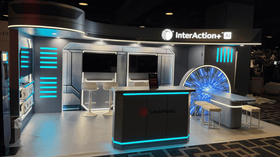 InterAction+ LMA 2026 10x20 software demo booth aisle view with legal CRM graphics and open booth entry
