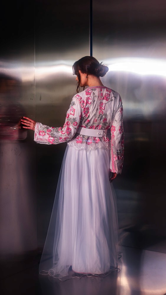 Blush pink Moroccan caftan with delicate embroidery, handcrafted luxury design for refined occasions in Bahrain
