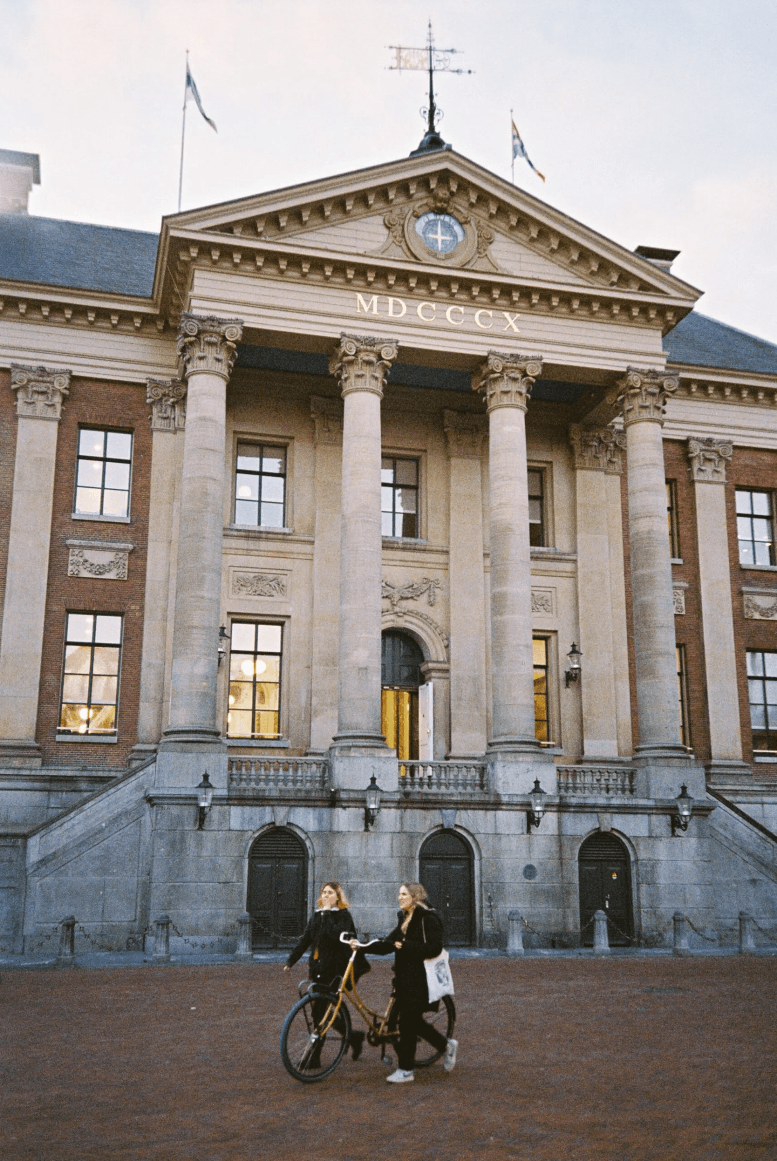Young Woman Looking at a Person Beside Her