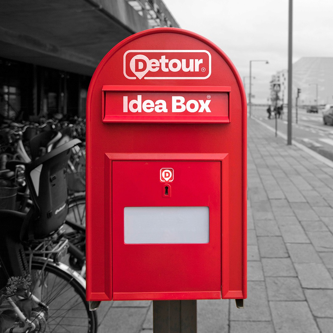 Red mailbox with the words "Idea Box" on the front